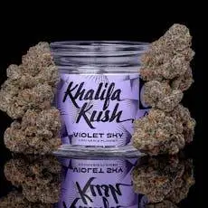 Violet Sky cannabis buds showcasing dense, frosty trichomes and vibrant purple hues